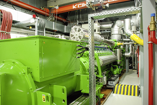 Voraussetzung, um ein Wärmenetz überhaupt wirtschaftlich zu betreiben, ist die Kraft-Wärme-Kopplung, wie hier mittels eines Blockheizkraftwerkes